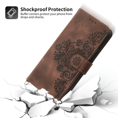 For iPhone 16e Skin-feel Flowers Embossed Wallet Leather Phone Case(Brown) by bashfashion
