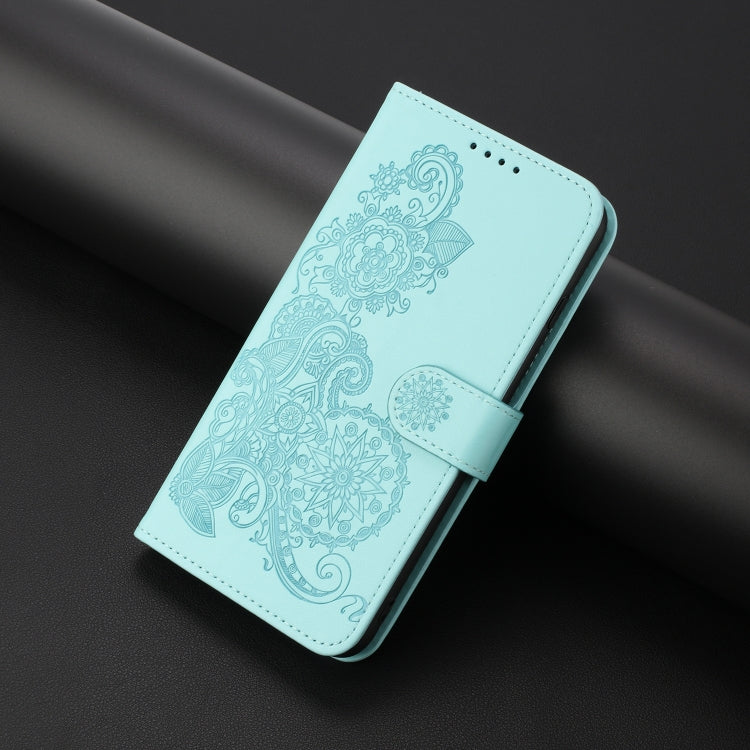 For iPhone 16e Datura Flower Embossed Flip Leather Phone Case(Light Blue) by bashfashion