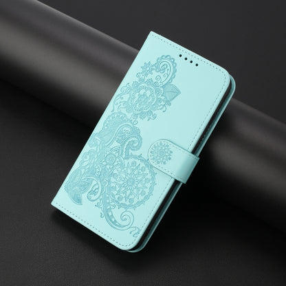 For iPhone 16e Datura Flower Embossed Flip Leather Phone Case(Light Blue) by bashfashion