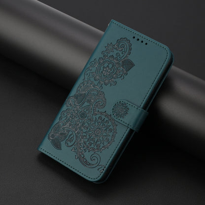 For iPhone 16e Datura Flower Embossed Flip Leather Phone Case(Dark Green) by bashfashion