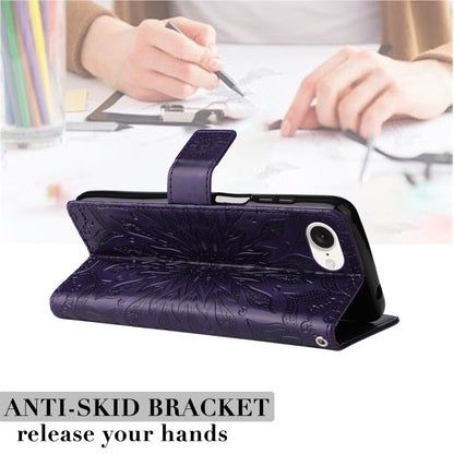 For iPhone 16e Embossed Sunflower Pattern Flip Leather Phone Case(Purple) by bashfashion