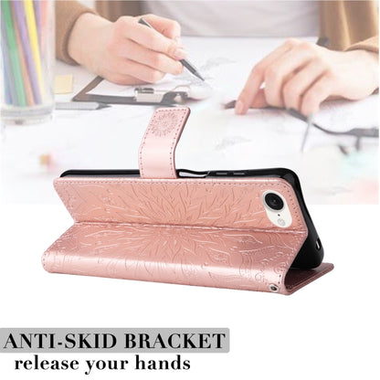 For iPhone 16e Embossed Sunflower Pattern Flip Leather Phone Case(Rose Gold) by bashfashion